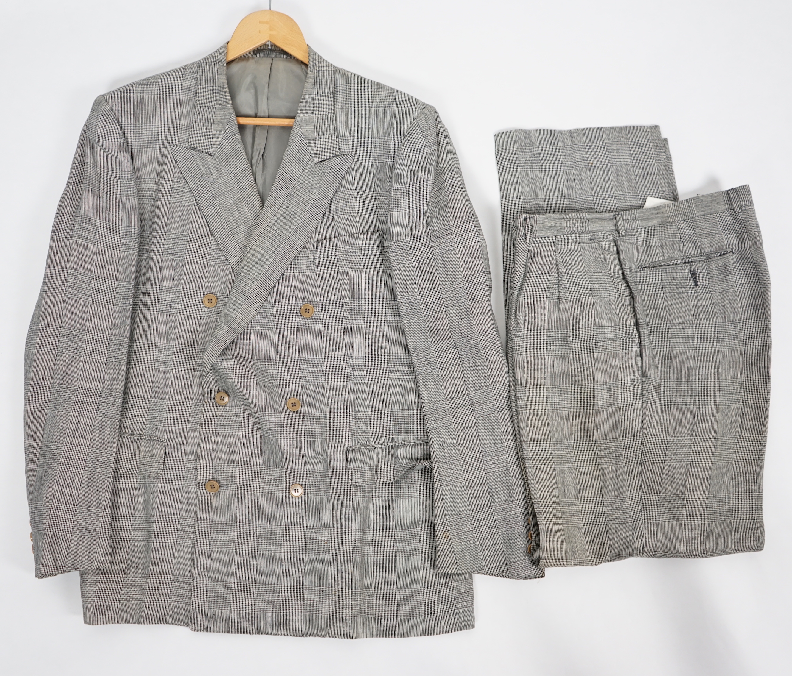 A Saint Laurent rive gauche gentlemen's Prince of Wales check double breasted linen suit, approx size 42